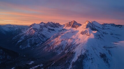 Sunset over Snowy Peaks