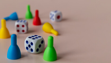 A board game of dice and chips on a light background. Time to rest.