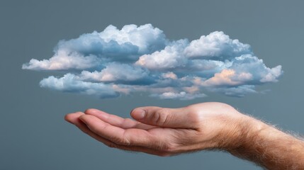 Hand holding cloud representing virtualization concept in technology and computing
