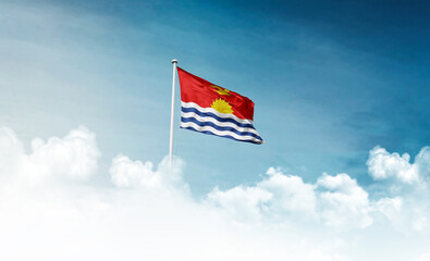 Kiribati national flag with mast waving in beautiful sky. Kiribati flag for Republic Day and Independence Day.