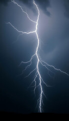 lightning bolt striking across a dark sky