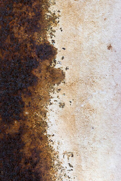 Brown and white rusted metal