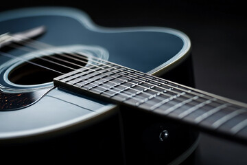 Fototapeta premium close up of black guitar with strings