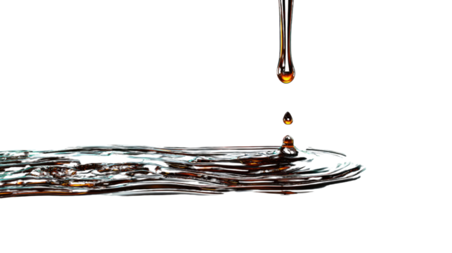 Golden Drip of Syrup: Captivating a close-up shot of thick, glistening syrup pouring, emphasizing the pure, natural essence of indulgence, a perfect visual for culinary arts and food