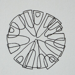 Pencil strokes. Black lines, turning chaos into an orderly circle on paper background. Concept of problem solving, psychology of mental health.