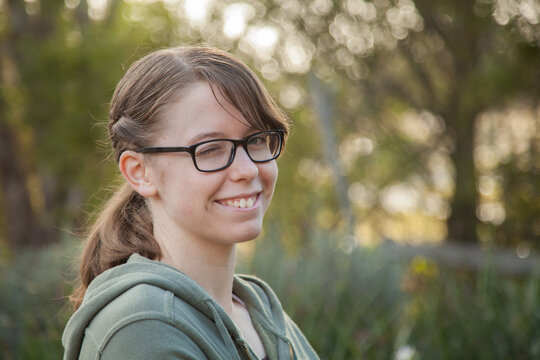 Close up portrait of a happy teen girl winking