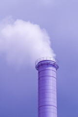 Tall industrial chimney emits dense white smoke, surrounded by metal railings near the top. Light purple tones dominate, giving an ethereal, dreamy atmosphere 