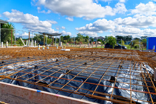 New construction site with groundwork and iron mesh laid
