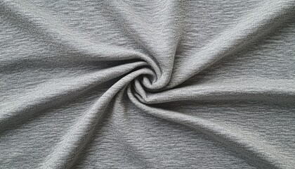 Fototapeta premium Close-up of gray fabric with natural wrinkles and soft texture.