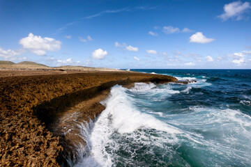 Waves crashing into Boka Tabla bay at Shete Boka National Park, Curacao