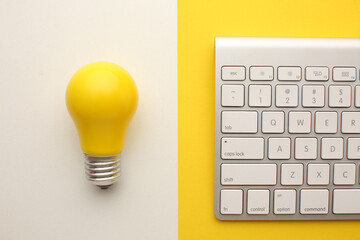 Business creativity and inspiration concepts with lightbulb and pencil on yellow background....