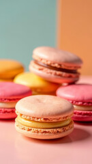 Fototapeta premium close up A stylish arrangement of macarons in different flavors, set against a pastel background, copy space, vertical