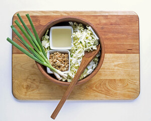 Crunchy Napa Salad Ingredients in Wooden Bowl 