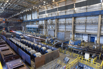 industrial plant for the production of sheet metal in a steel mill