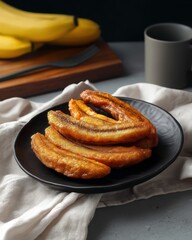 Golden crispy fried bananas served on a plate traditional sweet snack popular in tropical asian cuisine