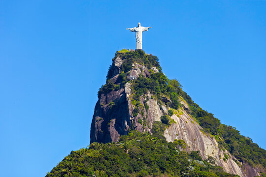 Statue of Christ the Redeemer agaist blue sky on Corcovado mountain, Rio de Janeiro, Brazil