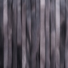 Fototapeta premium Wooden fence with textured surface against a deep black background creating a striking contrast