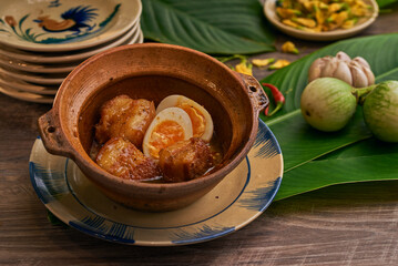 Traditional Vietnamese Food in wooden table with Green background
