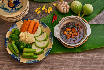 Traditional Vietnamese Food in wooden table with Green background
