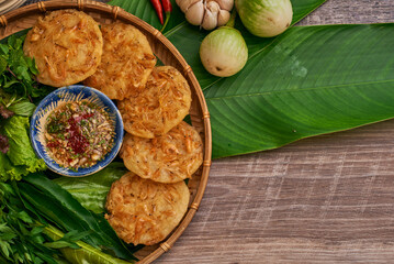 Traditional Vietnamese Food in wooden table with Green background
