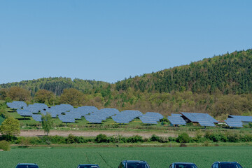 Solar Panel Farm on Green Hillside