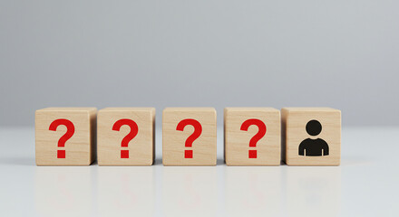 Red question mark symbols and human icon blocks representing uncertainty or decision making in business