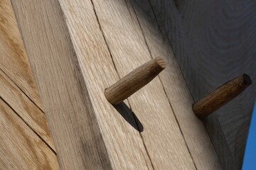 Oak wood condstruction of a house or barn. Architecture. Craft.