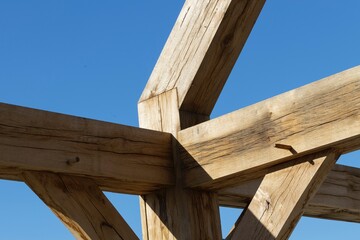 Oak wood condstruction of a house or barn. Architecture. Craft.