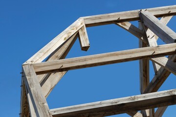 Oak wood condstruction of a house or barn. Architecture. Craft.
