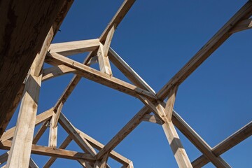 Oak wood condstruction of a house or barn. Architecture. Craft.