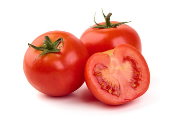 Ripe fresh tomatoes, close-up, isolated on white background.