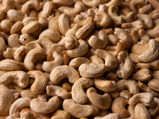 Full frame Cashew nuts background. Vegetarian Organic Healthy snack concept.