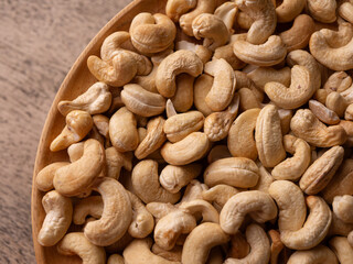 Full frame Cashew nuts background. Vegetarian Organic Healthy snack concept.