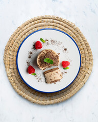 Chocolate and coffee mousse tartlets. Top view table.