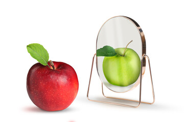 Red apple reflecting in mirror as green, white background. Opposite, contrast, difference