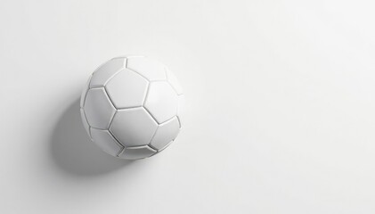 Fototapeta premium Overhead shot of pristine white football against white backdrop , equipment, photography