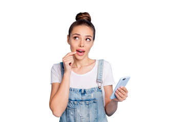 Photo of thinking pondering pensive planning charming cute girl holding phone with hand...