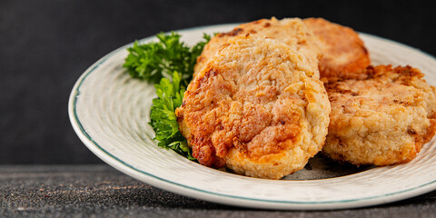 Meat cutlets pork, beef, chicken, lamb fried meat dish fresh delicious gourmet food background on the table rustic food top view copy space