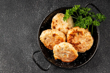 Meat cutlets pork, beef, chicken, lamb fried meat dish fresh delicious gourmet food background on the table rustic food top view copy space