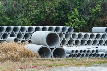 Concrete drainage pipes for industrial building construction.