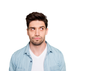 Photo of attractive bristled bearded man looking into empty space trying to find necessary information there isolated over green vivid color background