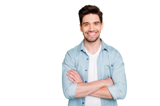 Photo of amazing business guy in excited mood with crossed hands looking forward to start working day wear casual denim shirt isolated over green color background