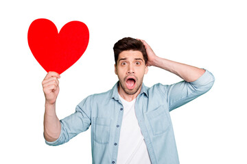 Photo of amazing guy holding big red paper heart forgot about romance surprise for girlfriend open...