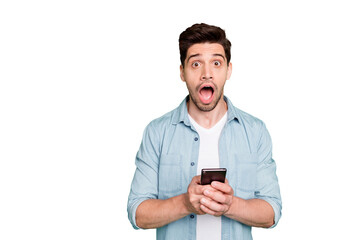 Photo of amazing guy holding telephone read instagram post negative comments not believe eyes open...