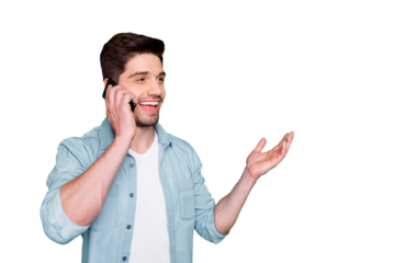 Photo of handsome guy holding telephone hand near ear listen best friend humorous story overjoyed good connection wear denim shirt isolated green color background