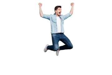 Full body photo of handsome guy jumping high sportive competition participant celebrating first place champion wear casual denim clothes isolated green color background