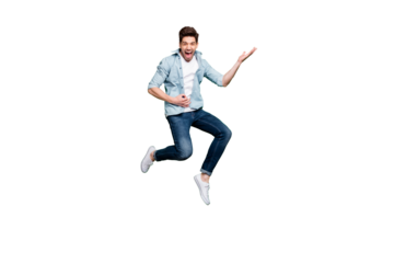 Full length body size photo of cheerful positive ecstatic overjoyed man pretending to be playing guitar wearing white sneakers jumping like rocker on stage isolated over green vivid color background