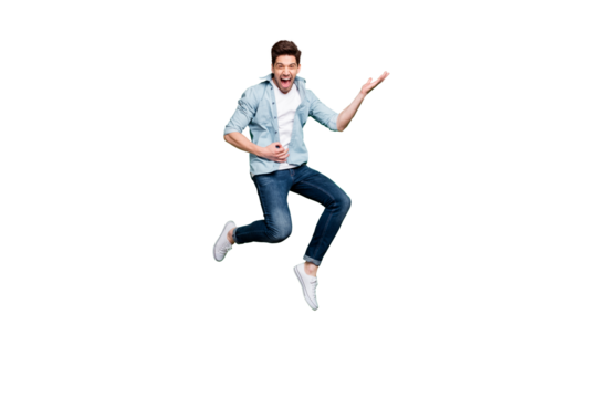 Full length body size photo of cheerful positive ecstatic overjoyed man pretending to be playing guitar wearing white sneakers jumping like rocker on stage isolated over green vivid color background