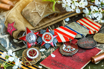 Naklejka premium Orders and medals of the USSR.Awards of the Second world war close-up.Victory Day - 9 of may 1945. Soviet military awards.Phaleristics.Antikvariat.