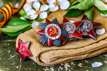 Naklejka premium Orders and medals of the USSR.Awards of the Second world war close-up.Victory Day - 9 of may 1945. Soviet military awards.Phaleristics.Antikvariat.